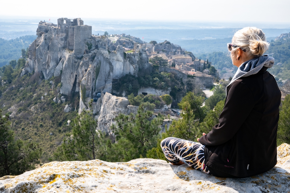 Female,Traveller,Looking,At,The,Village,Of,Les,Baux,De