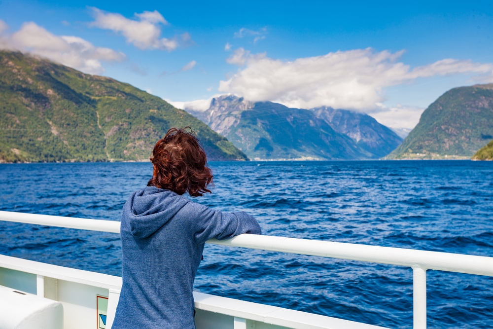 Tourism,Vacation,And,Travel.,Tourist,Woman,On,Cruise,Ship,Enjoying