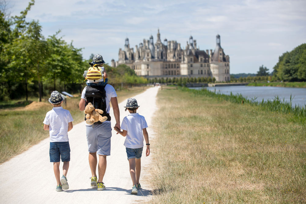 Happy,Children,Walking,On,The,Premises,Of,Chambord,Castle,On
